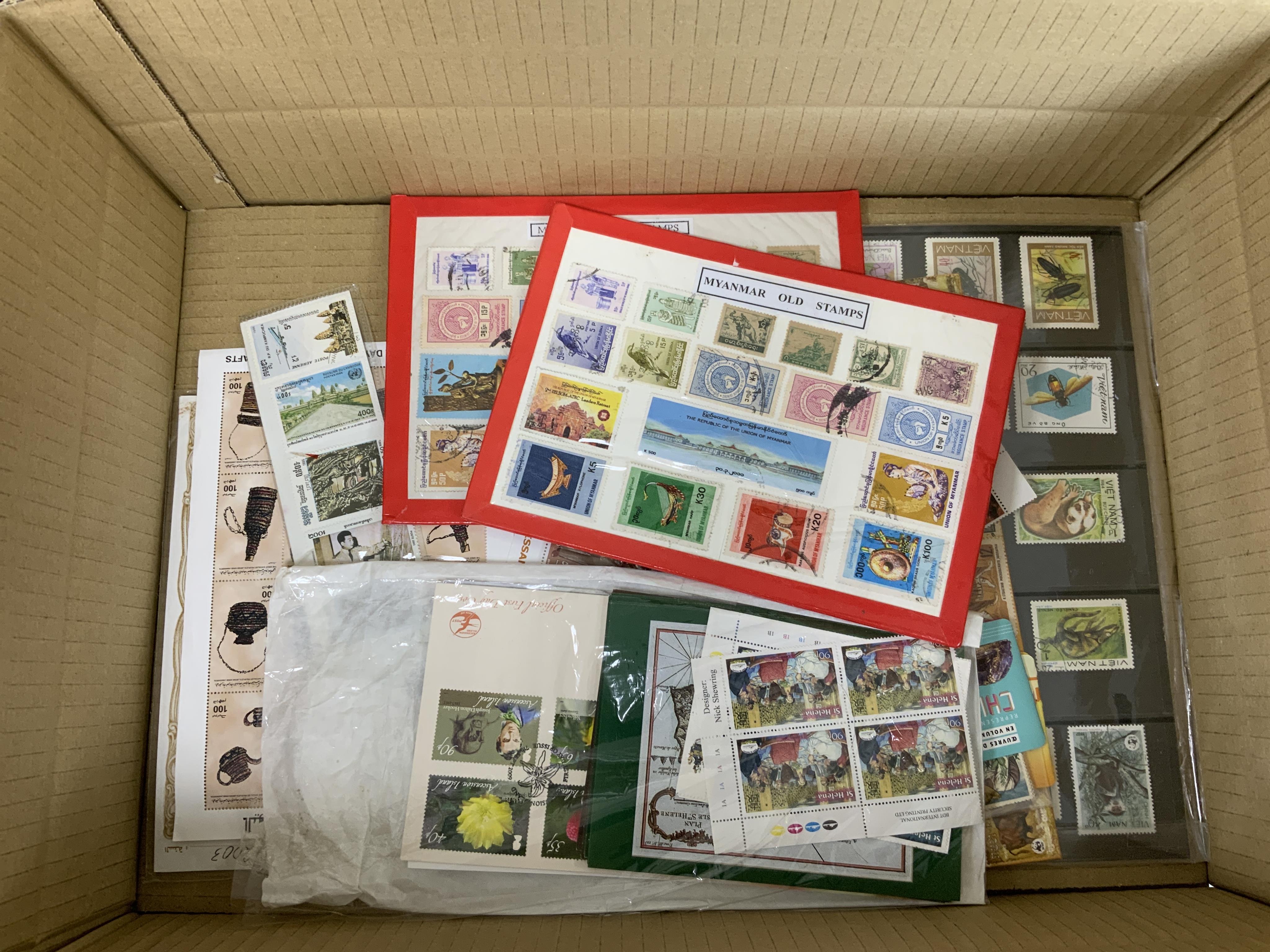 A collection of world stamps including two case selections of stamps in individual perspective cases from the Philatelic Legends ‘Historic Stamps’ collection, including Vichy France, US Civil War, the Cape triangle stamp